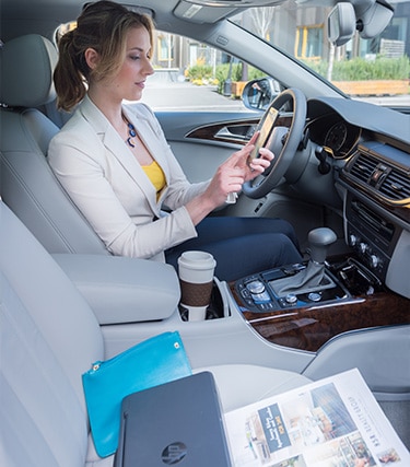 Person carrying the mobile printer while driving