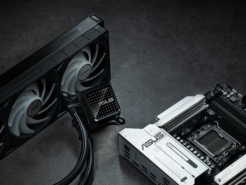 ASUS motherboard and AIO cooler on a table.